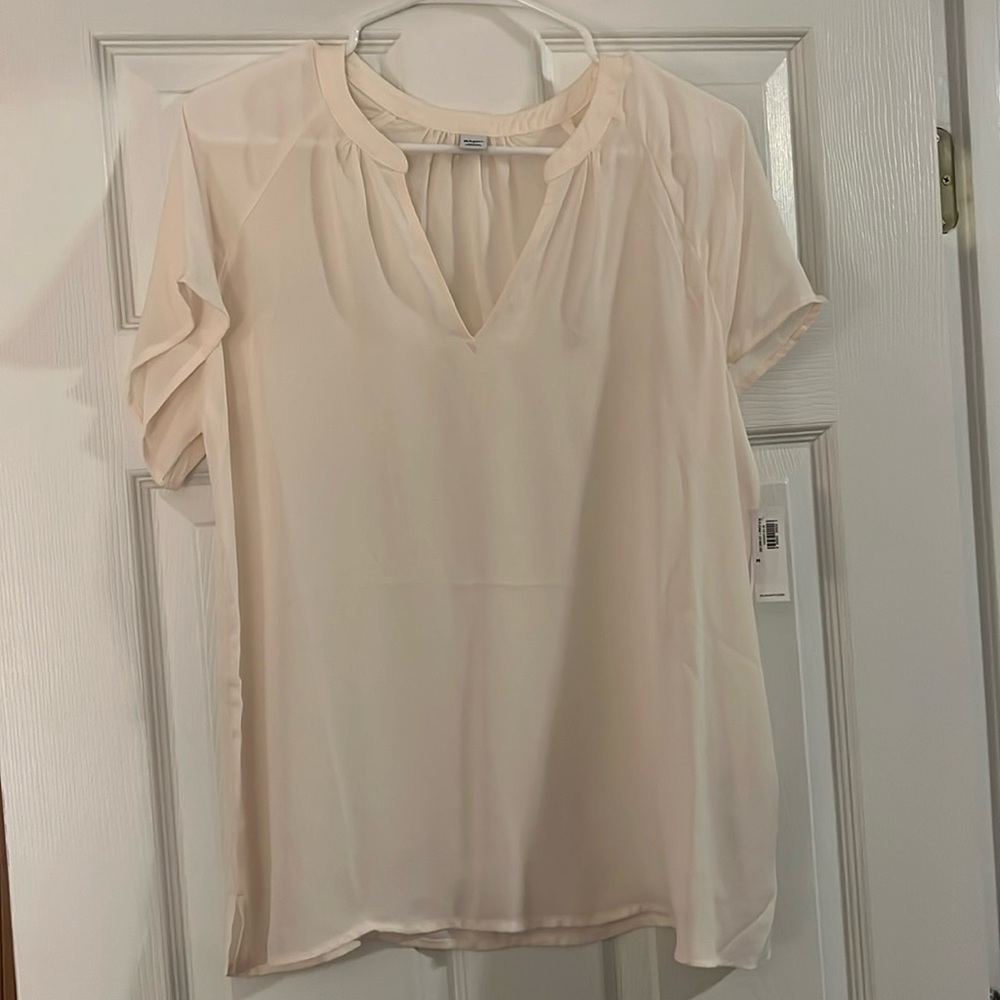 Cream short sleeved v-neck blouse